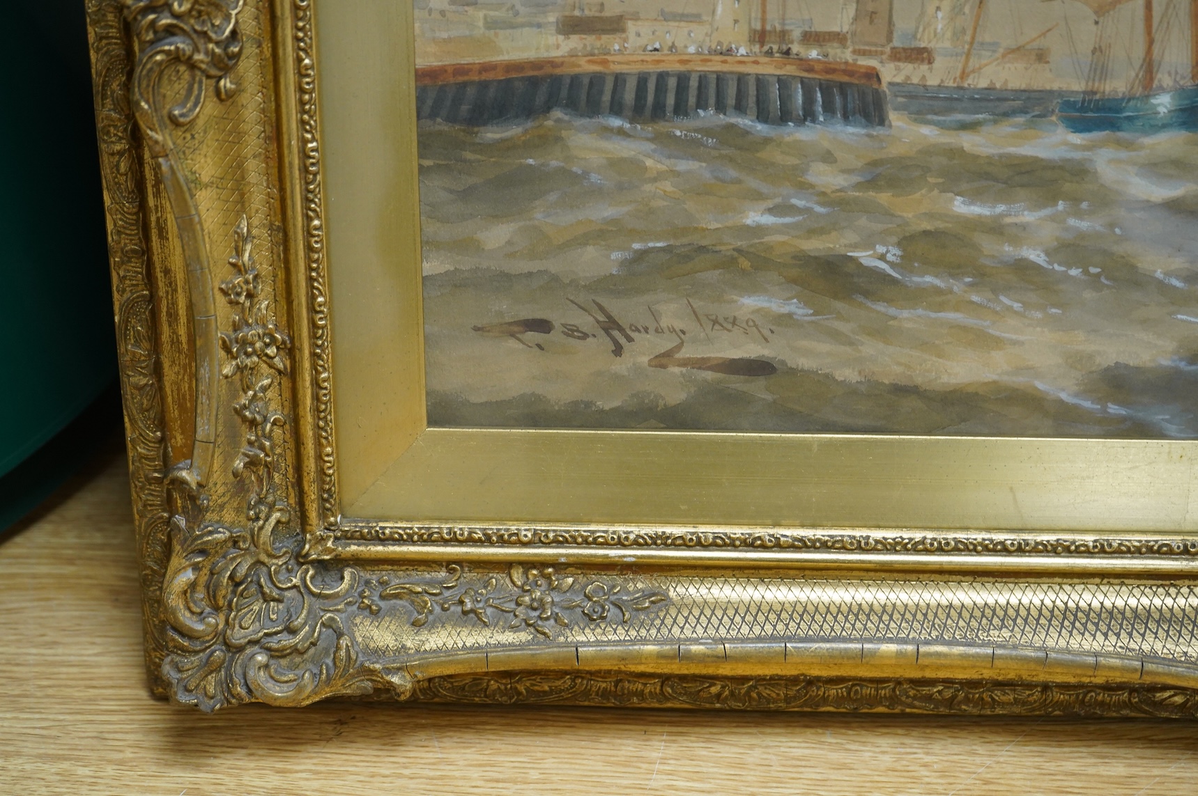 Thomas Bush Hardy (1842-1897), Maritime scene with ships before a lighthouse, dated 1889, watercolour heightened with white, 29 x 75cm, ornate gilt frame